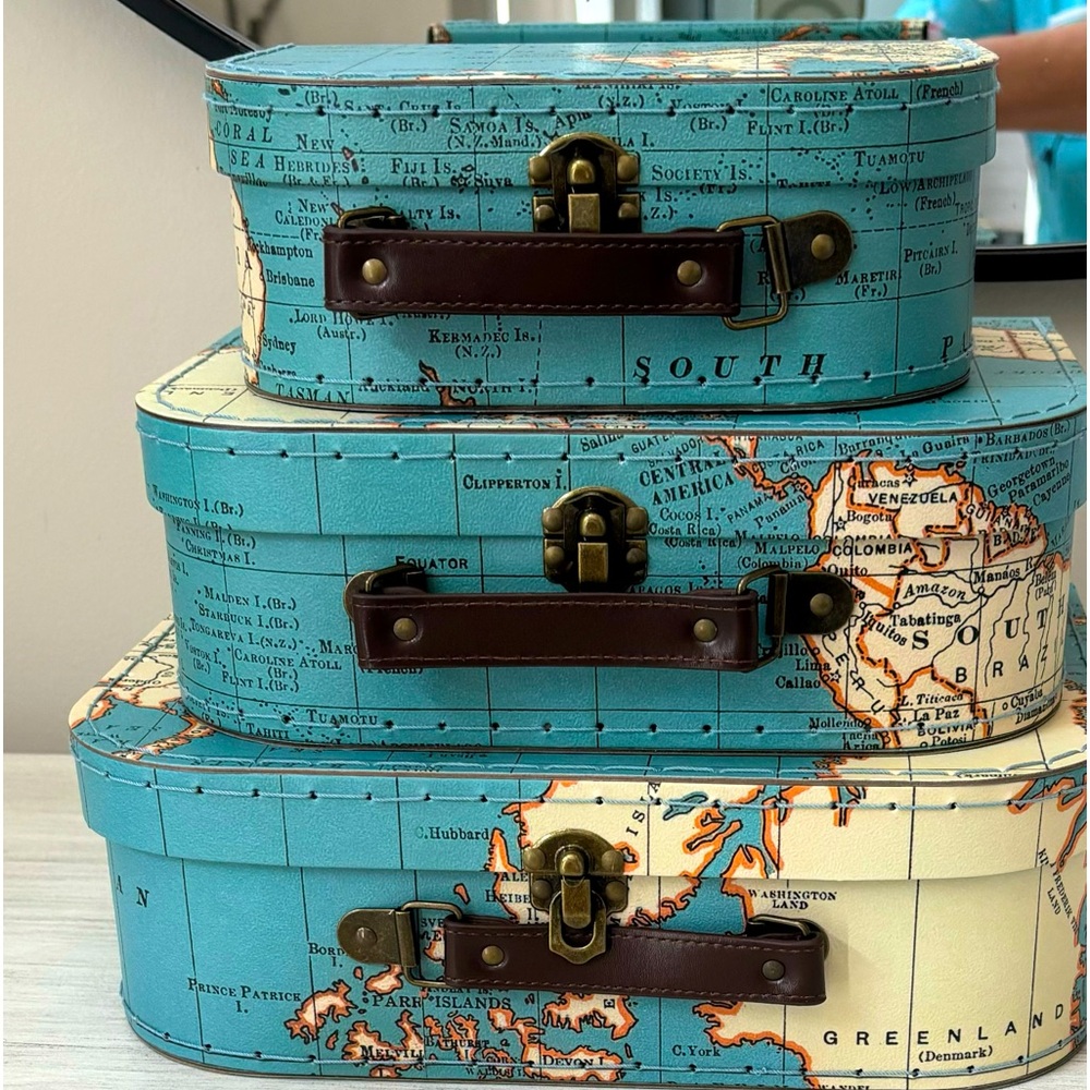 Vintage world paperboard suitcases for storage.